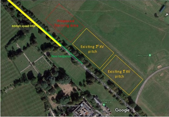 a photograph taken from Google maps looking down on Marlborough Common. It shows green fields with a road running diagonally across it.  Three rectangles are marked in different colours