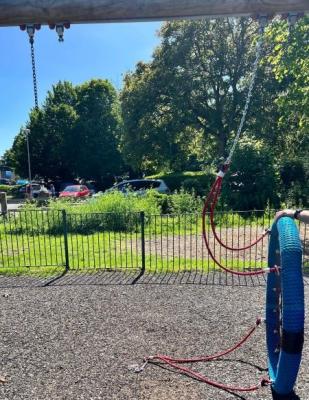 -broken-basket-swing lying on its side