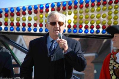 A man speaks into a microphone